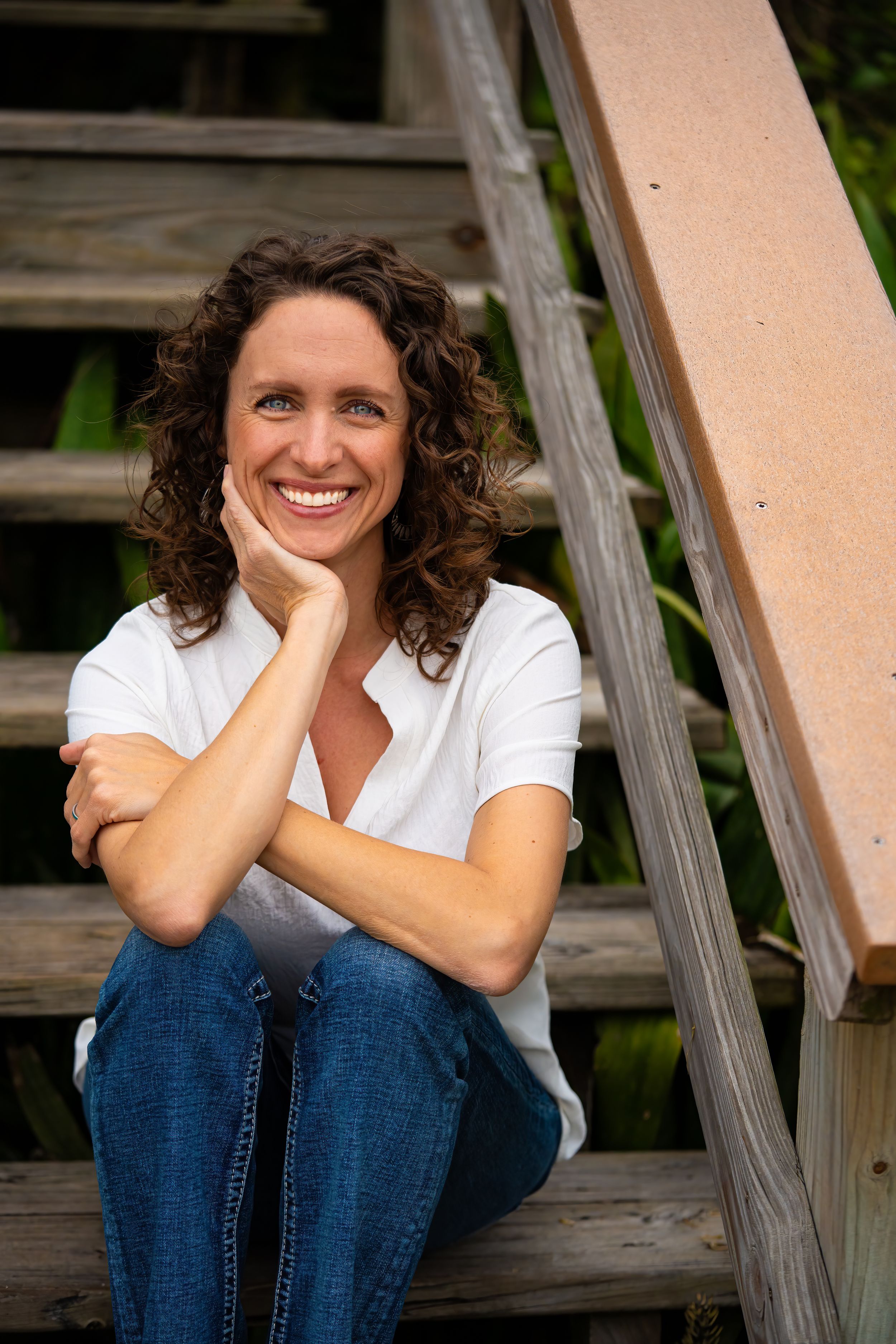 Casey Thomas photography posing on the beach of DuBois park in Jupiter, Florida.