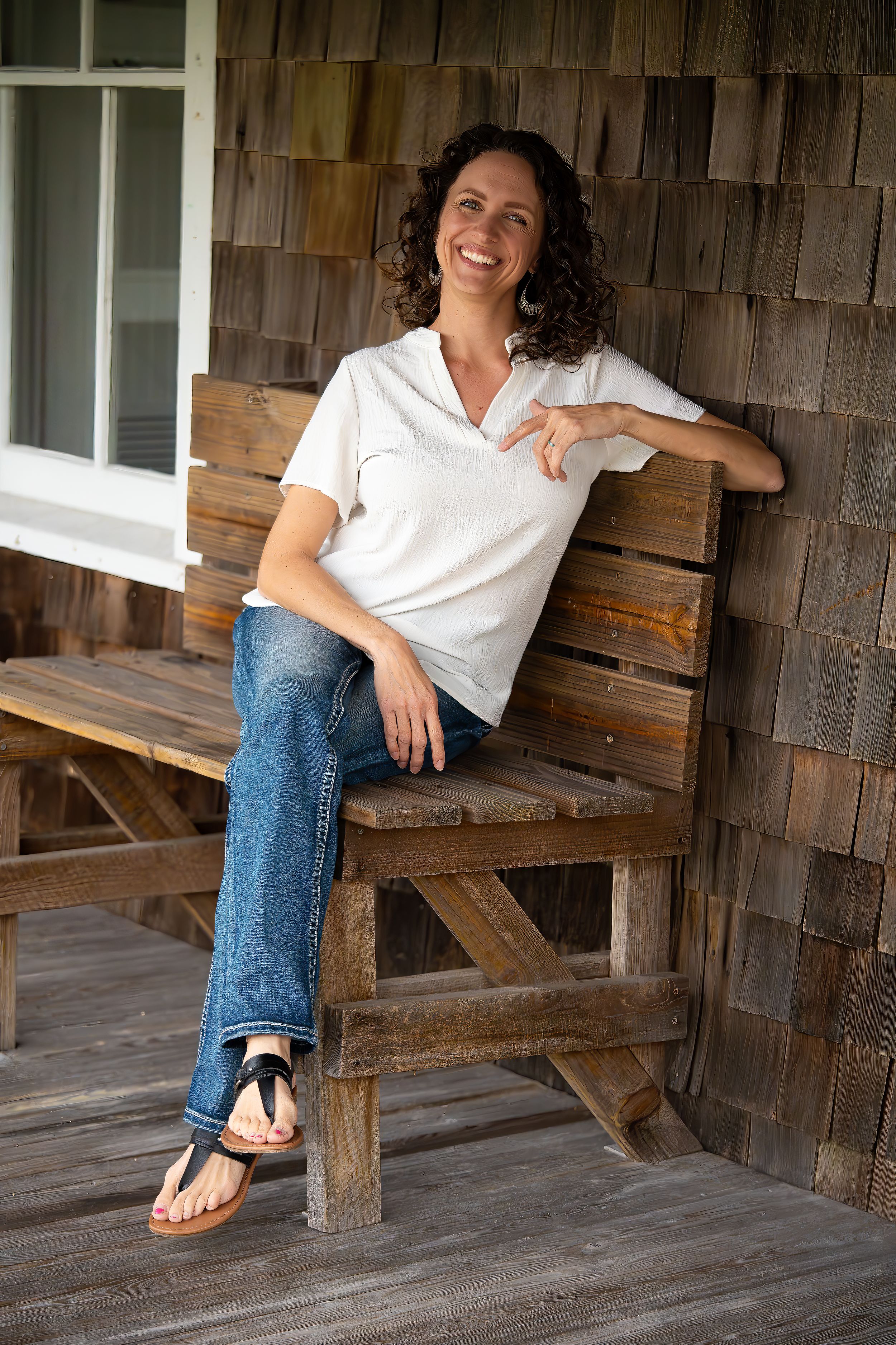 Casey Thomas photography posing on the beach of DuBois park in Jupiter, Florida.
