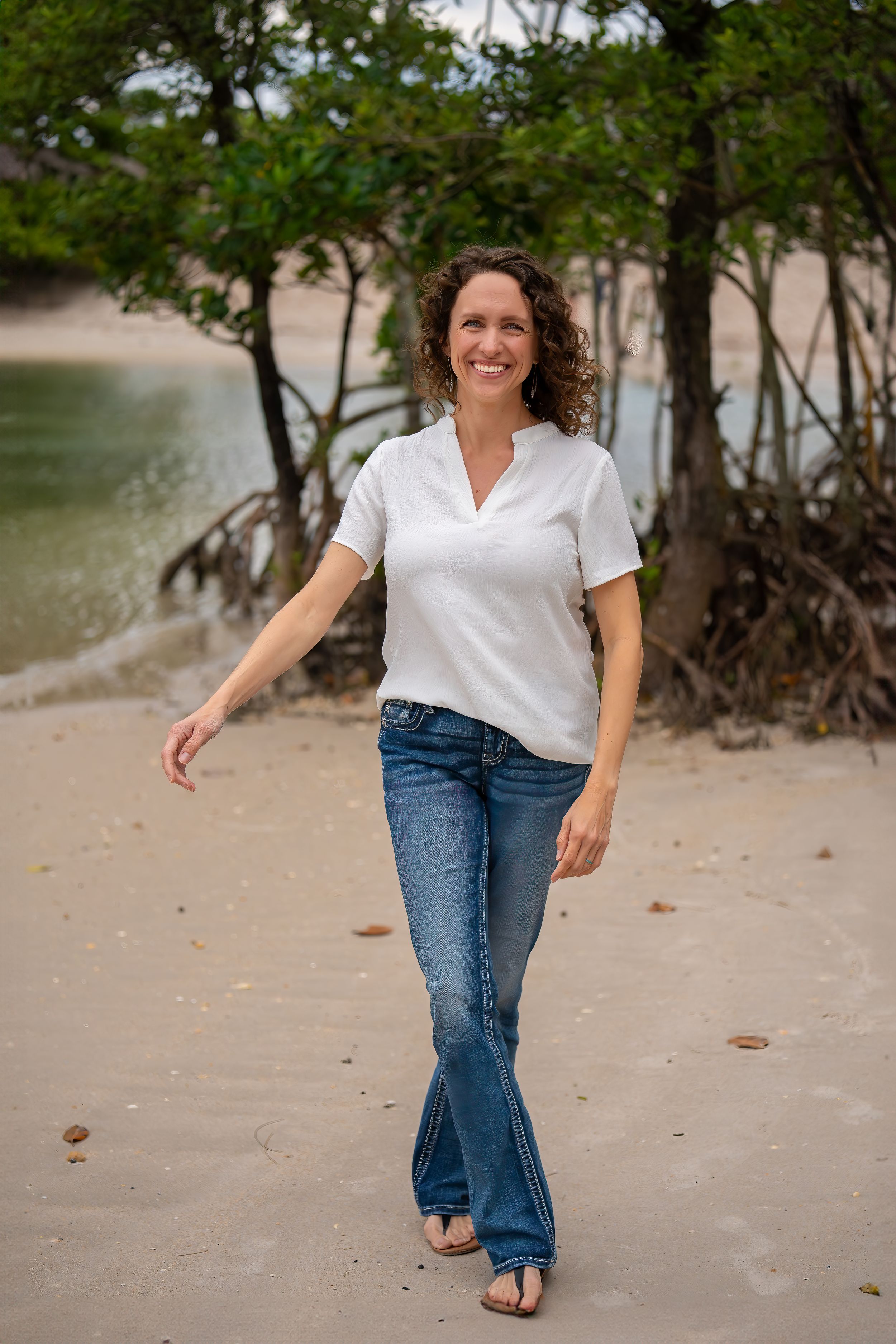 Casey Thomas photography posing on the beach of DuBois park in Jupiter, Florida.