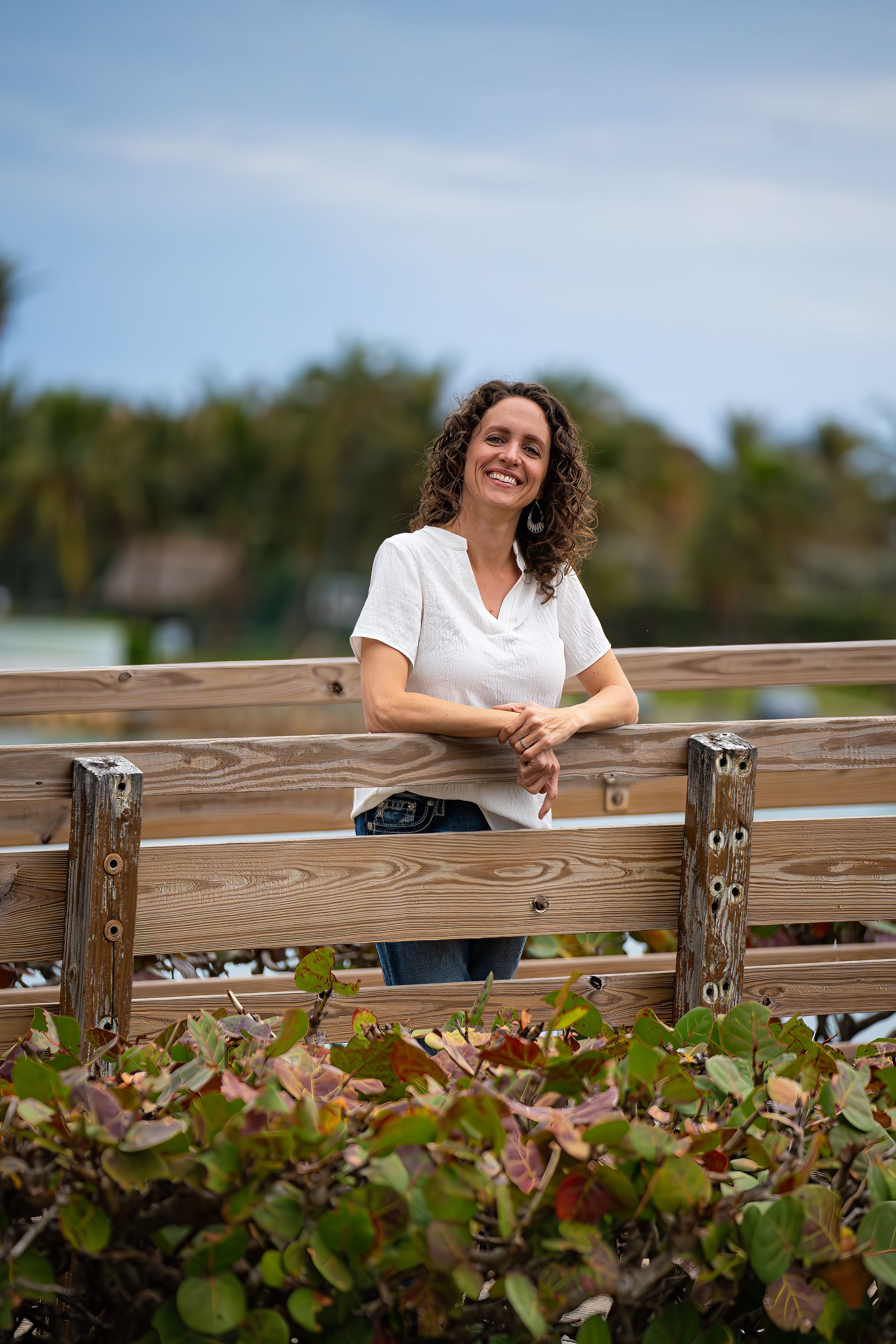 Casey Thomas photography posing on the beach of DuBois park in Jupiter, Florida.