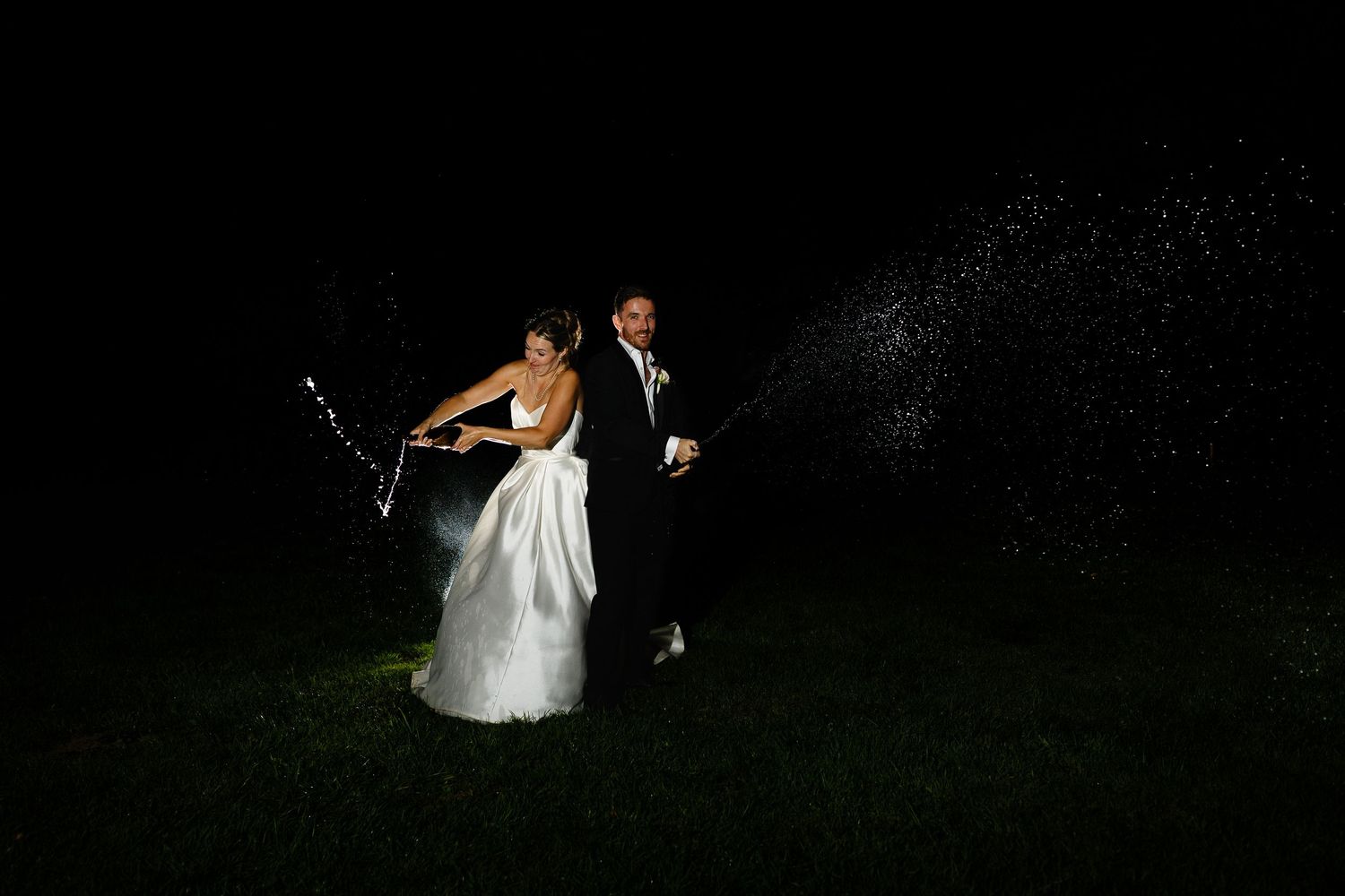 Bride and groom dance together in romantic poses across a series of black and white wedding photographs.