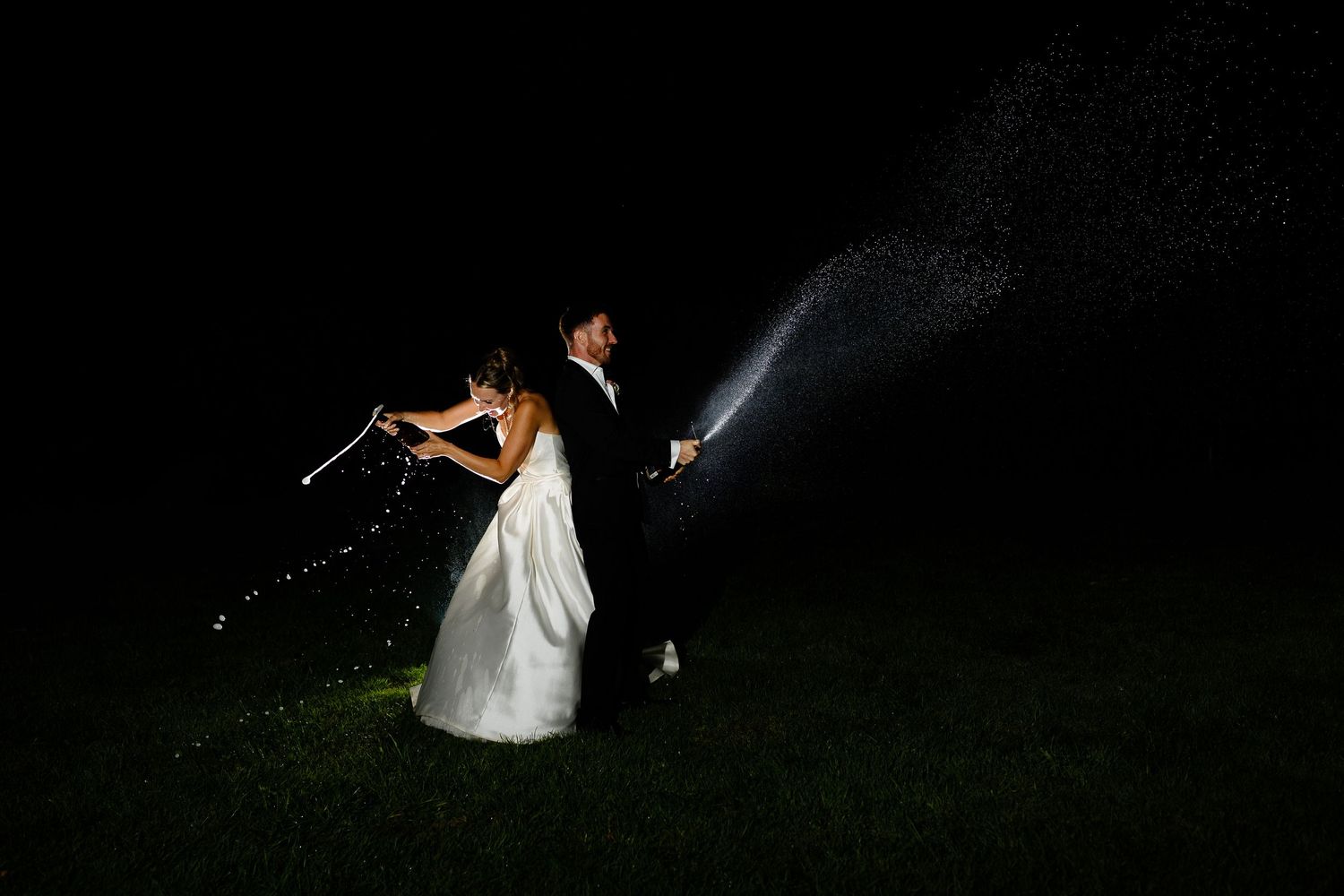 A sequence of silhouetted figures dancing and twirling against a dark background in a romantic outdoor setting.