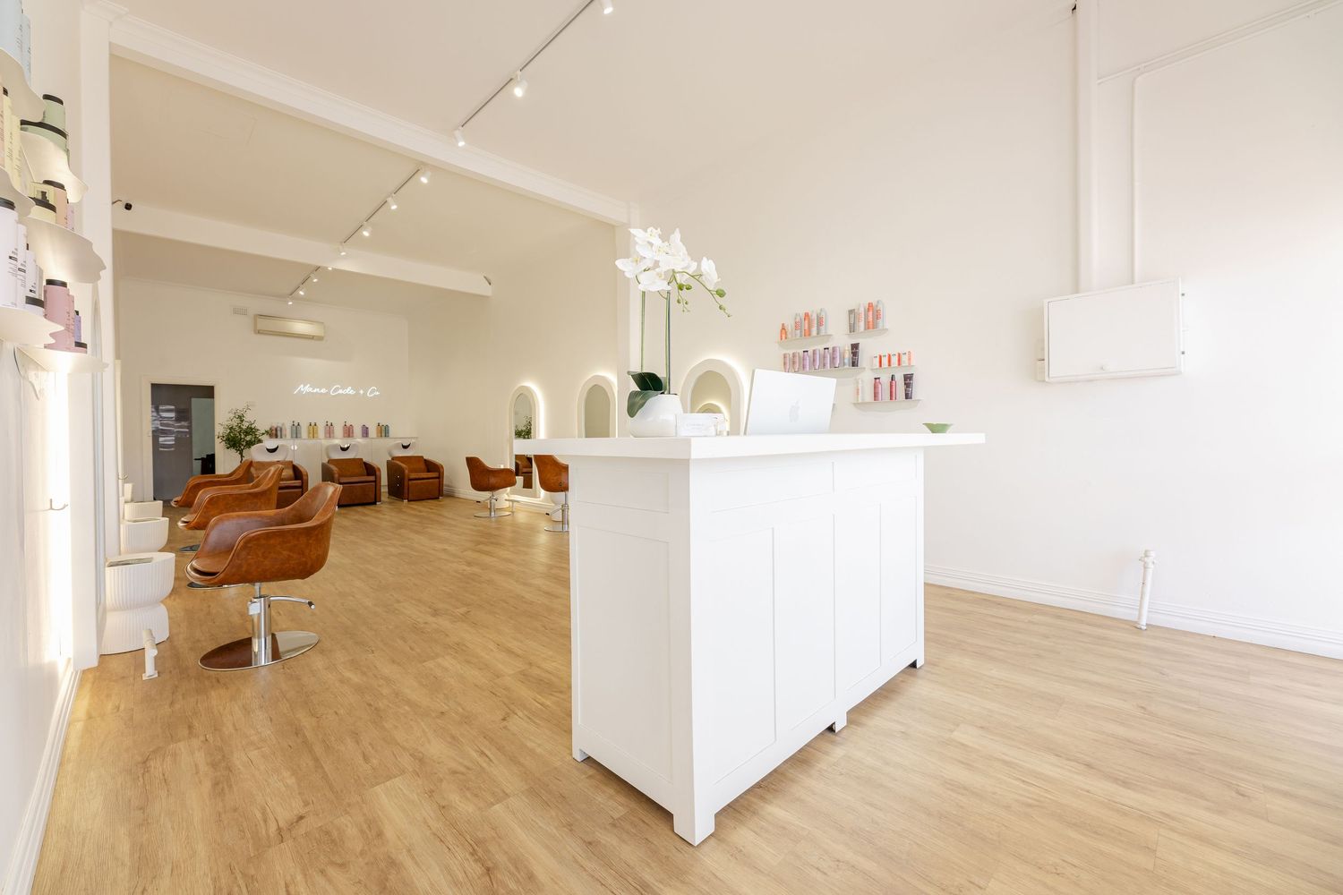 A bright modern hair salon interior photography by Kirsten Graham