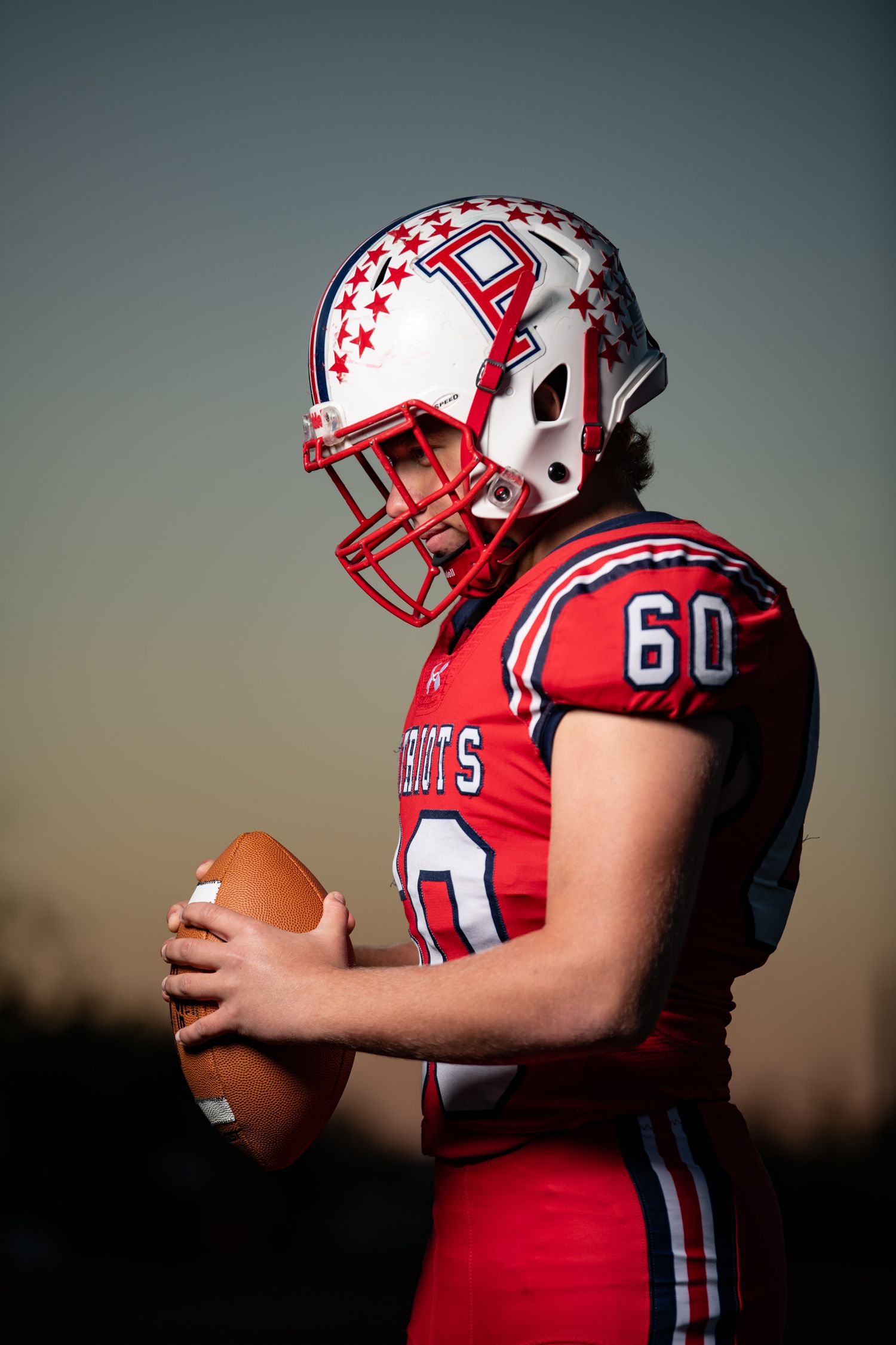 Rhode Islands #1 Athlete Photography Studio, capturing High School students favorites sports in motion with dramatic lighting 
Football
