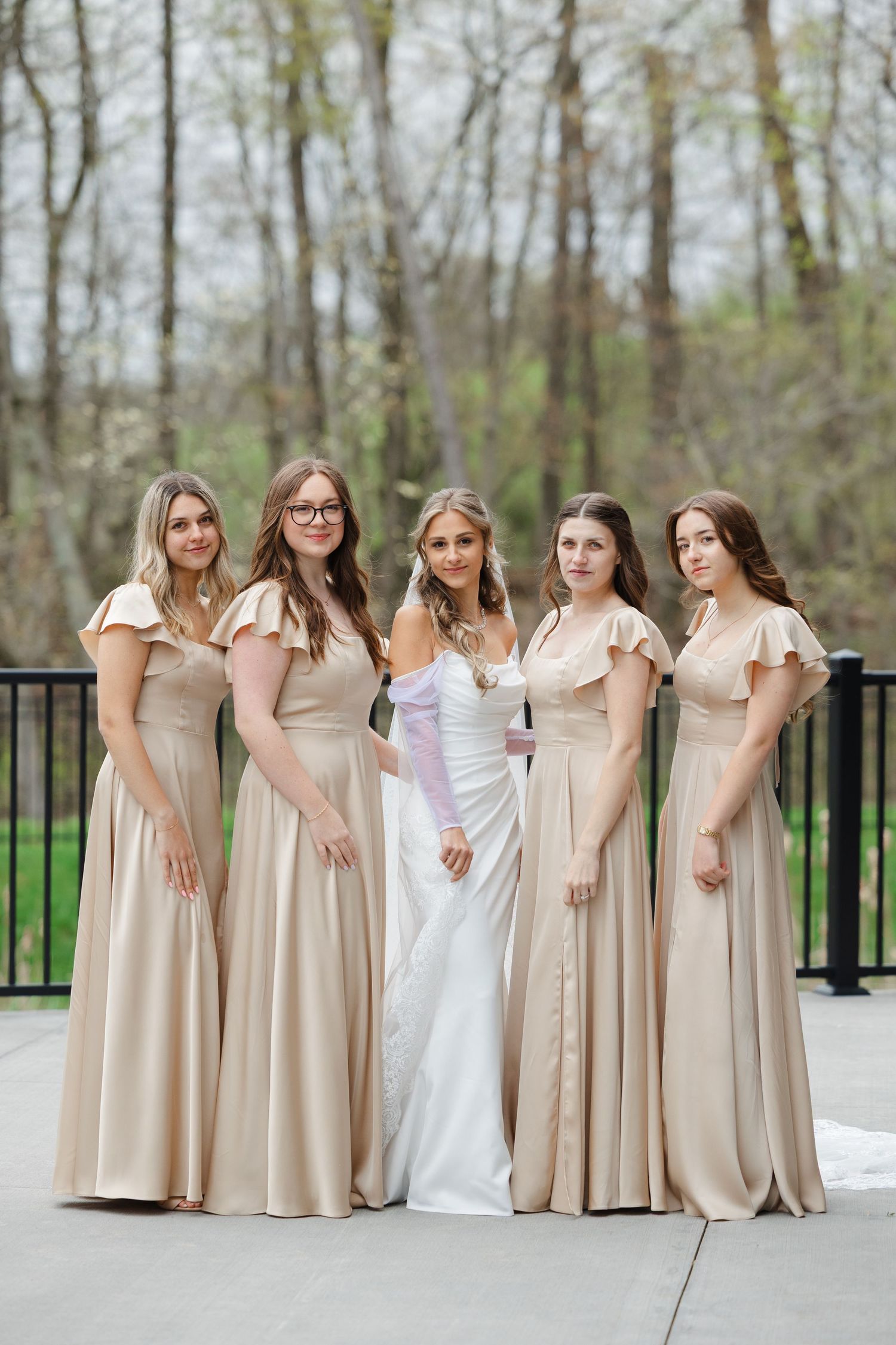 Bride with bridesmaids outside Reserve at Stone Creek in North Canton photographed by Tom Forrest from Hudson, Ohio.