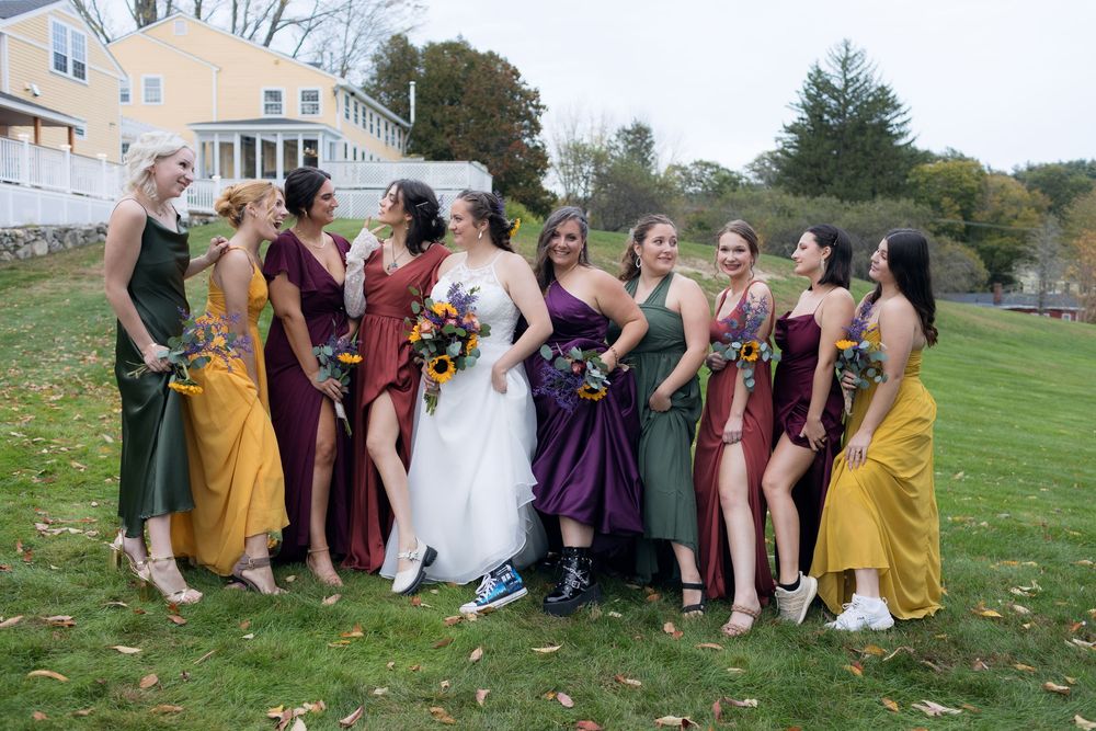 Bridesmaids show off their array of shoes at Westbrook Inn in Derry New Hampshire for bridal party photos. Concord wedding photographer