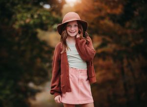 Outdoor fall photoshoot with rustic autumn colors and natural lighting.
Best child's photographer in Illinois