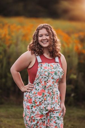 Senior with hand on hip in a field smiling at camera

Best senior photographer, Peoria, IL.