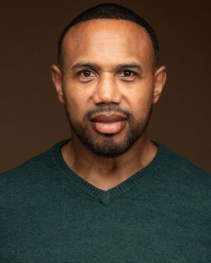 Headshot portrait of a male actor
