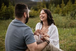 couple holding hands and joking around