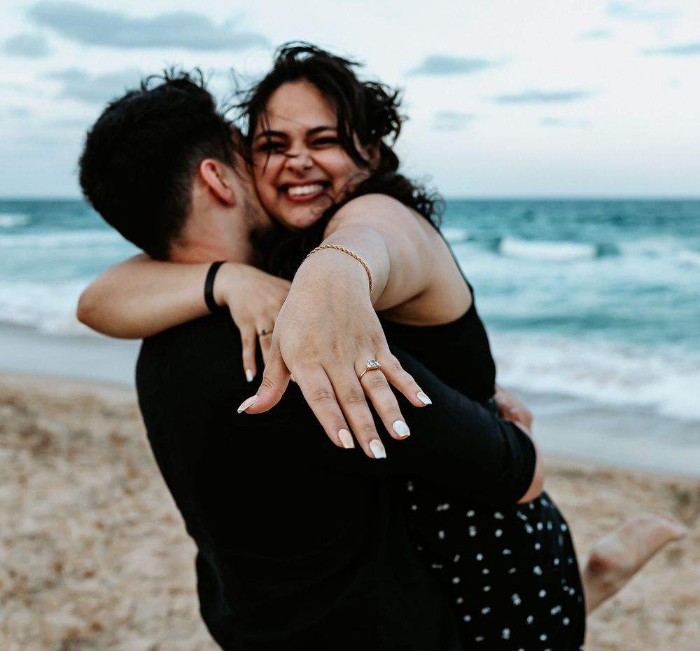 Surprise proposal photography session at sunset golden hour overlooking Mudjimba beach on the Sunshine Coast.