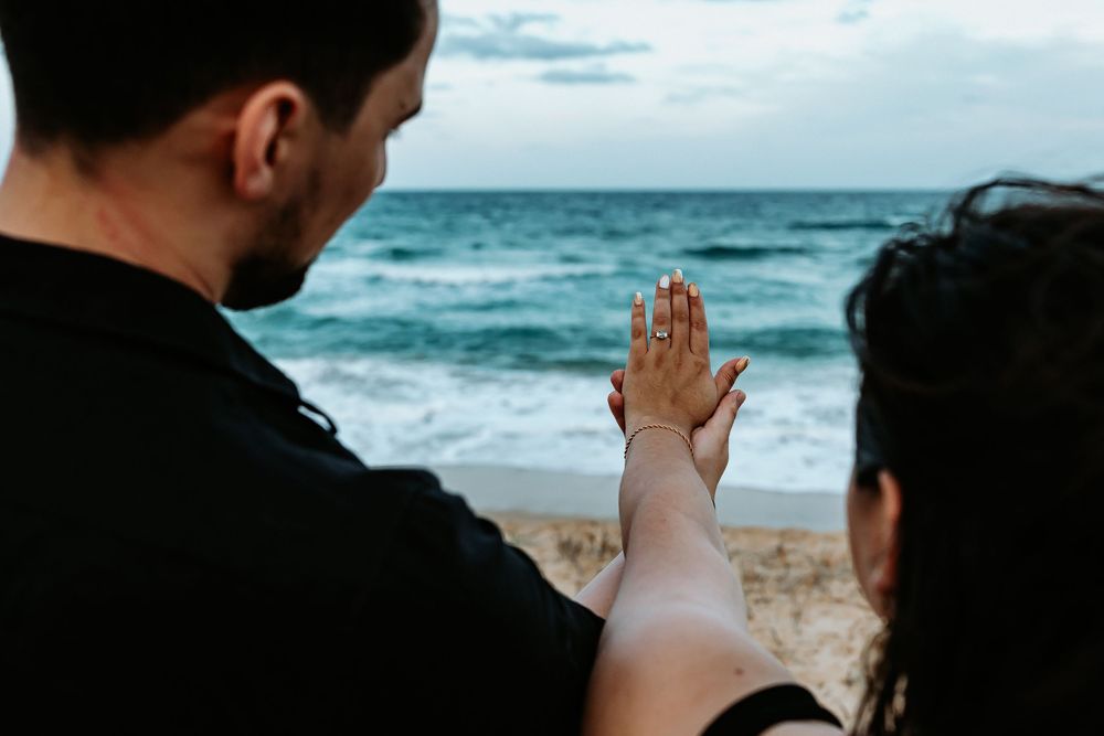 Surprise proposal photography session at sunset golden hour overlooking Mudjimba beach on the Sunshine Coast.
