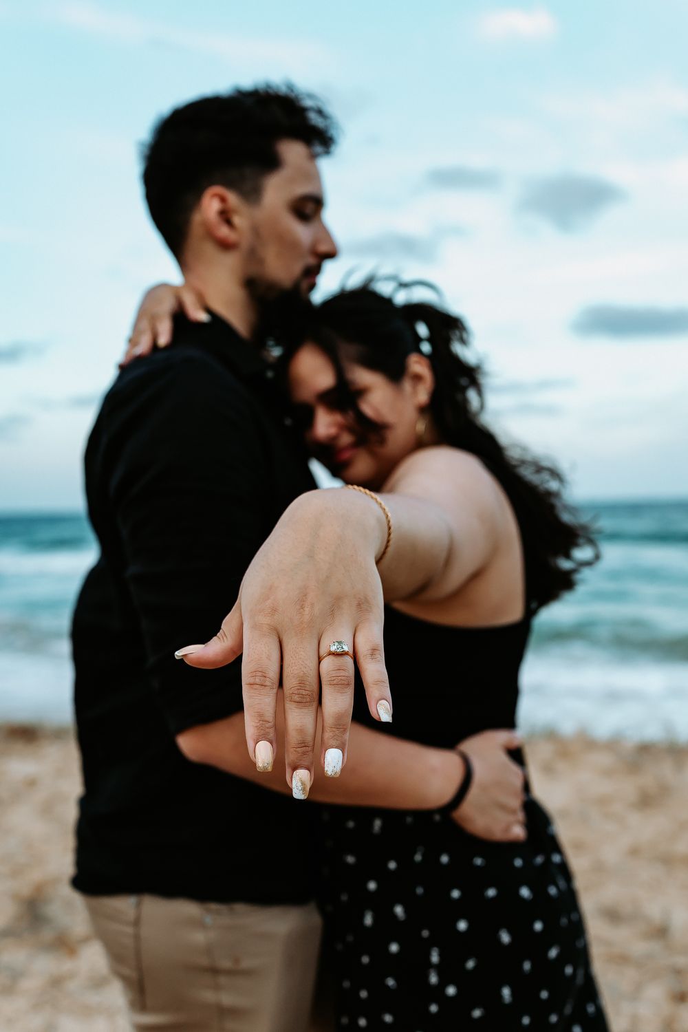 Surprise proposal photography session at sunset golden hour overlooking Mudjimba beach on the Sunshine Coast.