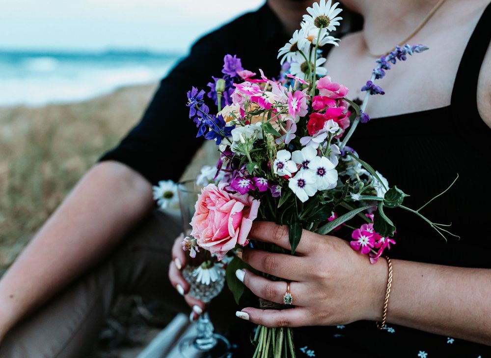 Surprise proposal photography session at sunset golden hour overlooking Mudjimba beach on the Sunshine Coast.