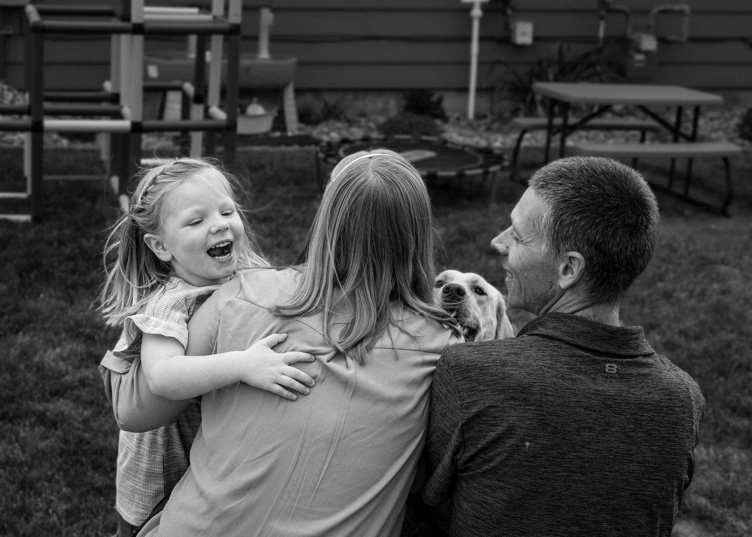 Chouteau County family photoshoot among autumn leaves in fall, candid smiles photography, lifestyle photography
