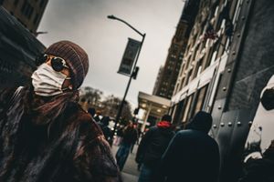 Urban street scene with dramatic lighting and architectural elements.