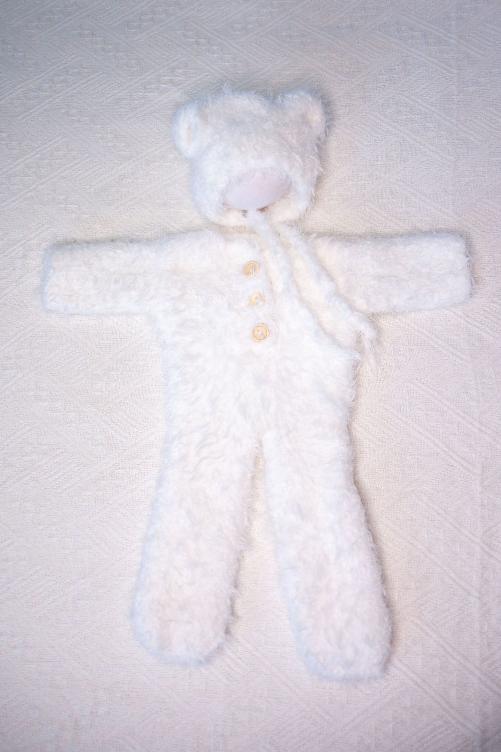 Knitted newborn bear outfit