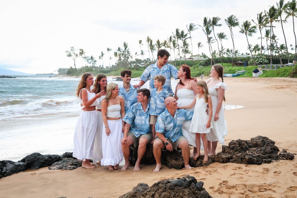 A collage of beach wedding photos showing people in white and blue attire posing on a tropical Hawaiian shoreline.