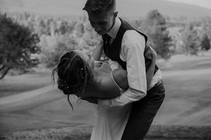 A romantic black and white photo series showing tender moments between a couple during an outdoor wedding celebration.