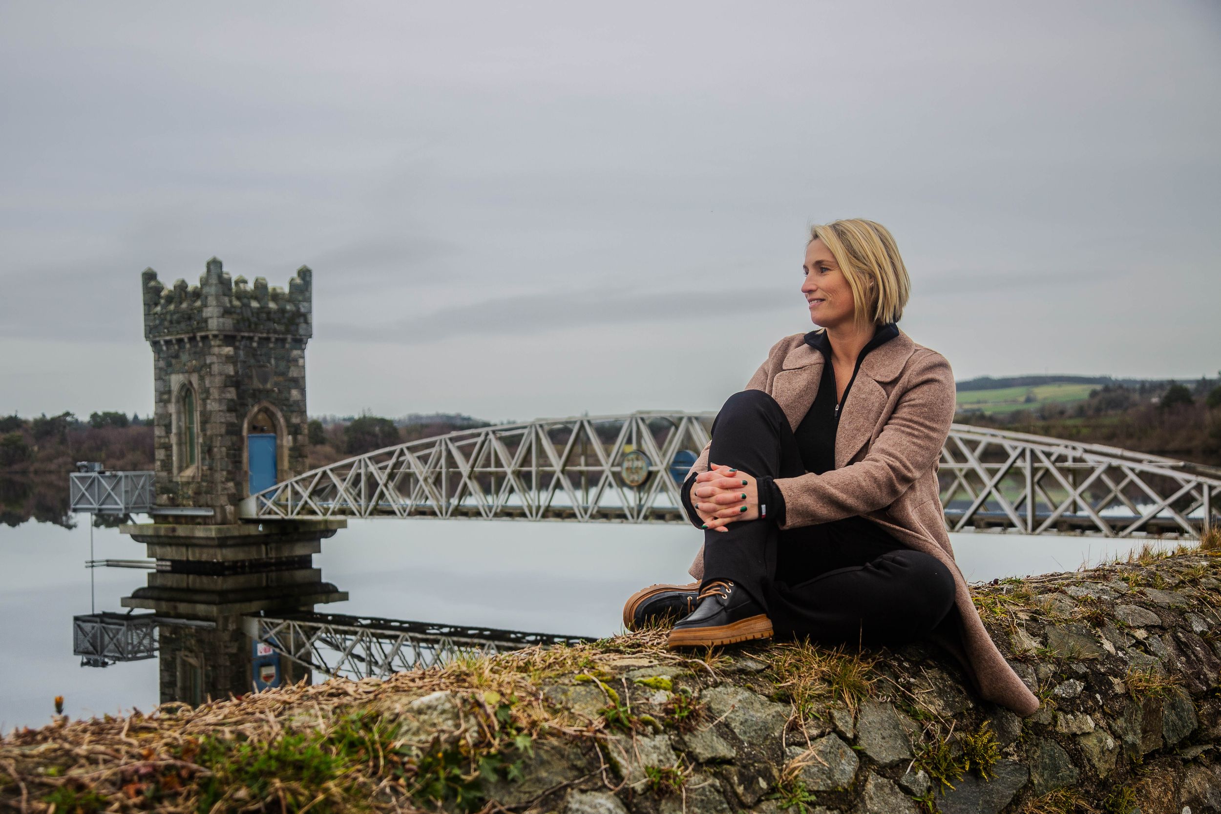 portrait of lady enjoying the views of Vartry Reservoir Draw Tower during private tour of Wicklow just south of Dublin