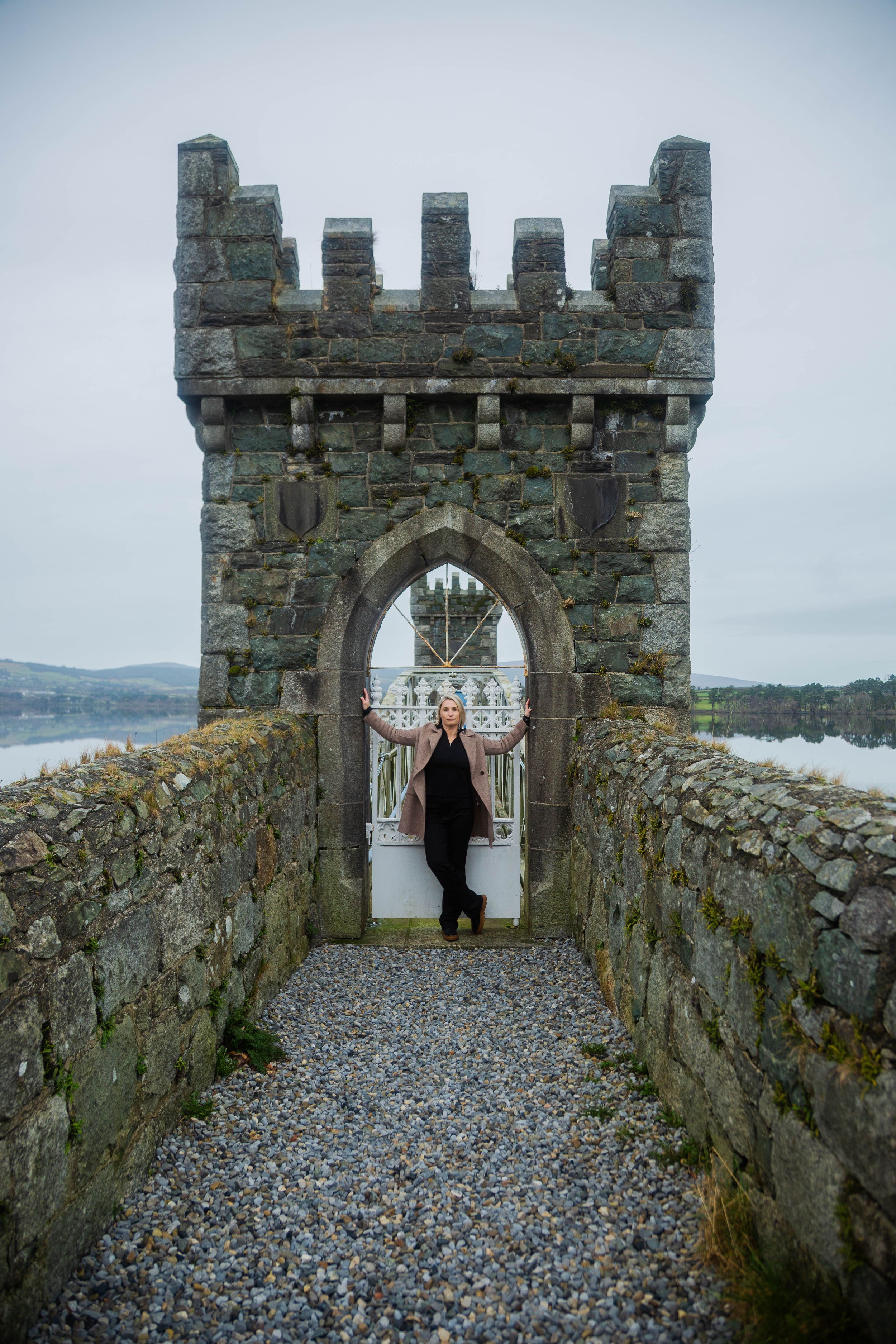 portrait of tourist standing in front of Vartry Reservoir Lower Draw Tower.