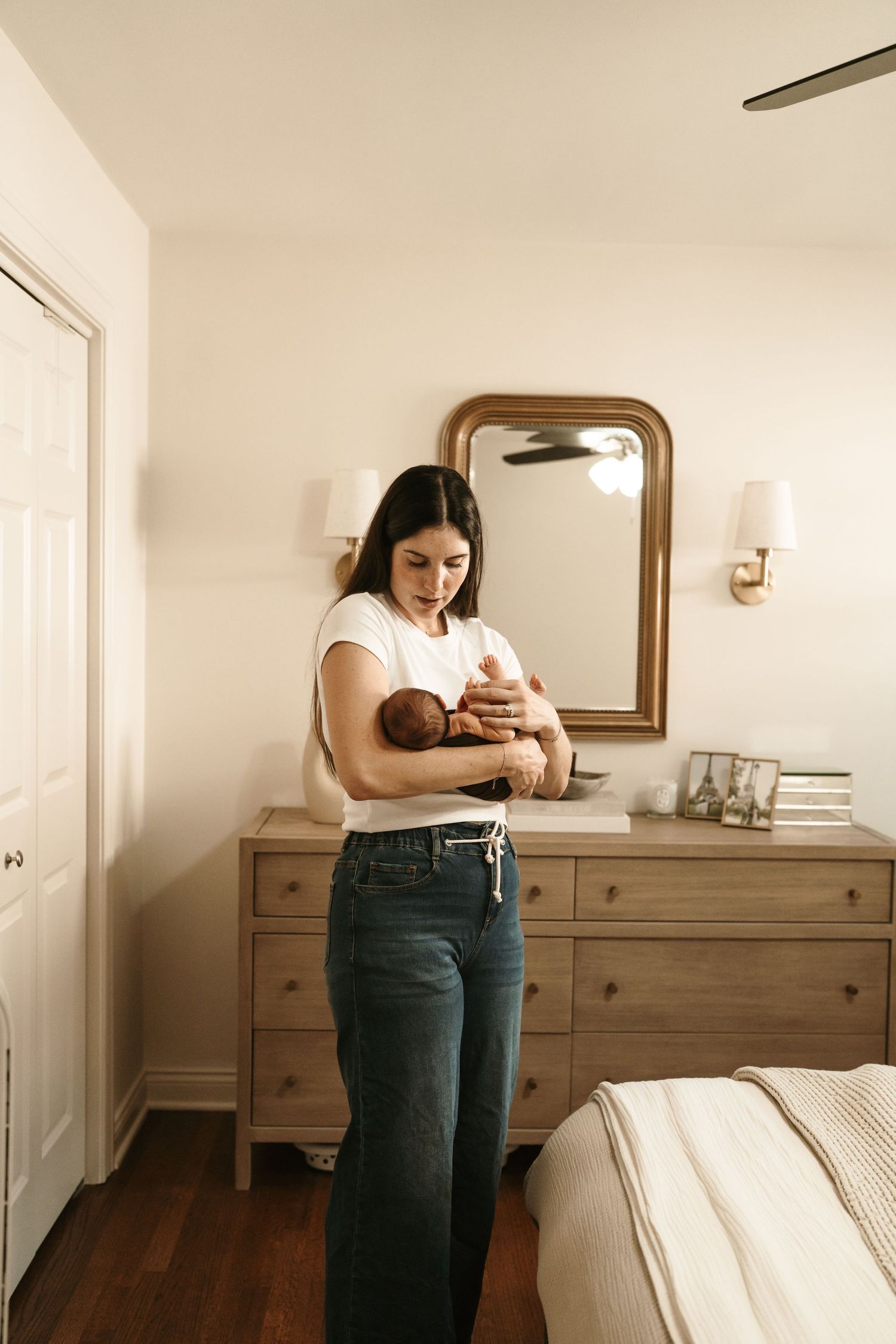 A series of four photos showing someone sitting on a bed in a sunlit bedroom with wooden furniture.