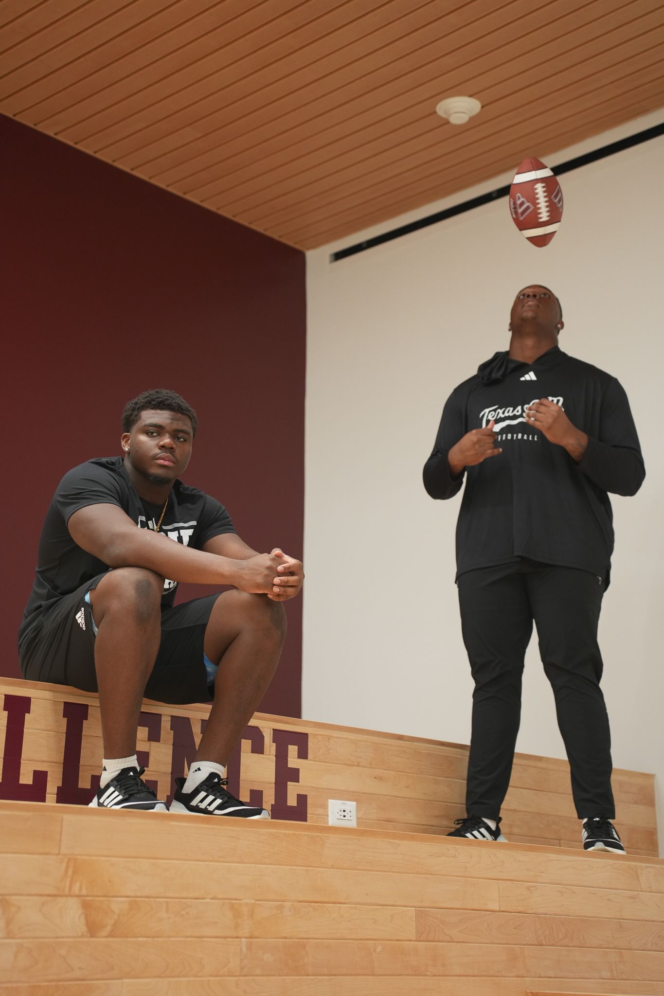 Football player in an Adidas brand shoot, showcasing athleticism and style on the field.