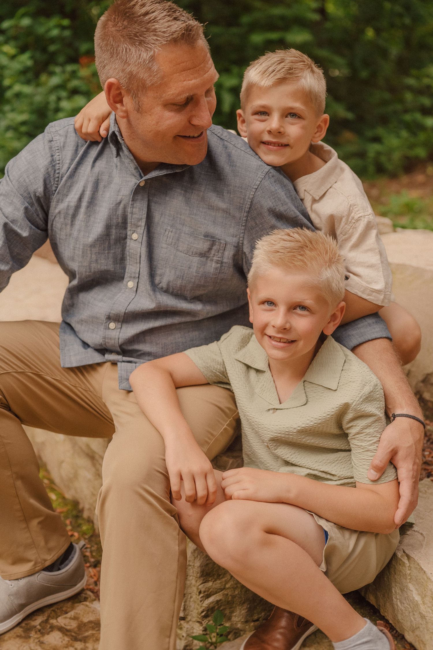 Family members share joyful moments sitting together outdoors in a series of connected candid shots.