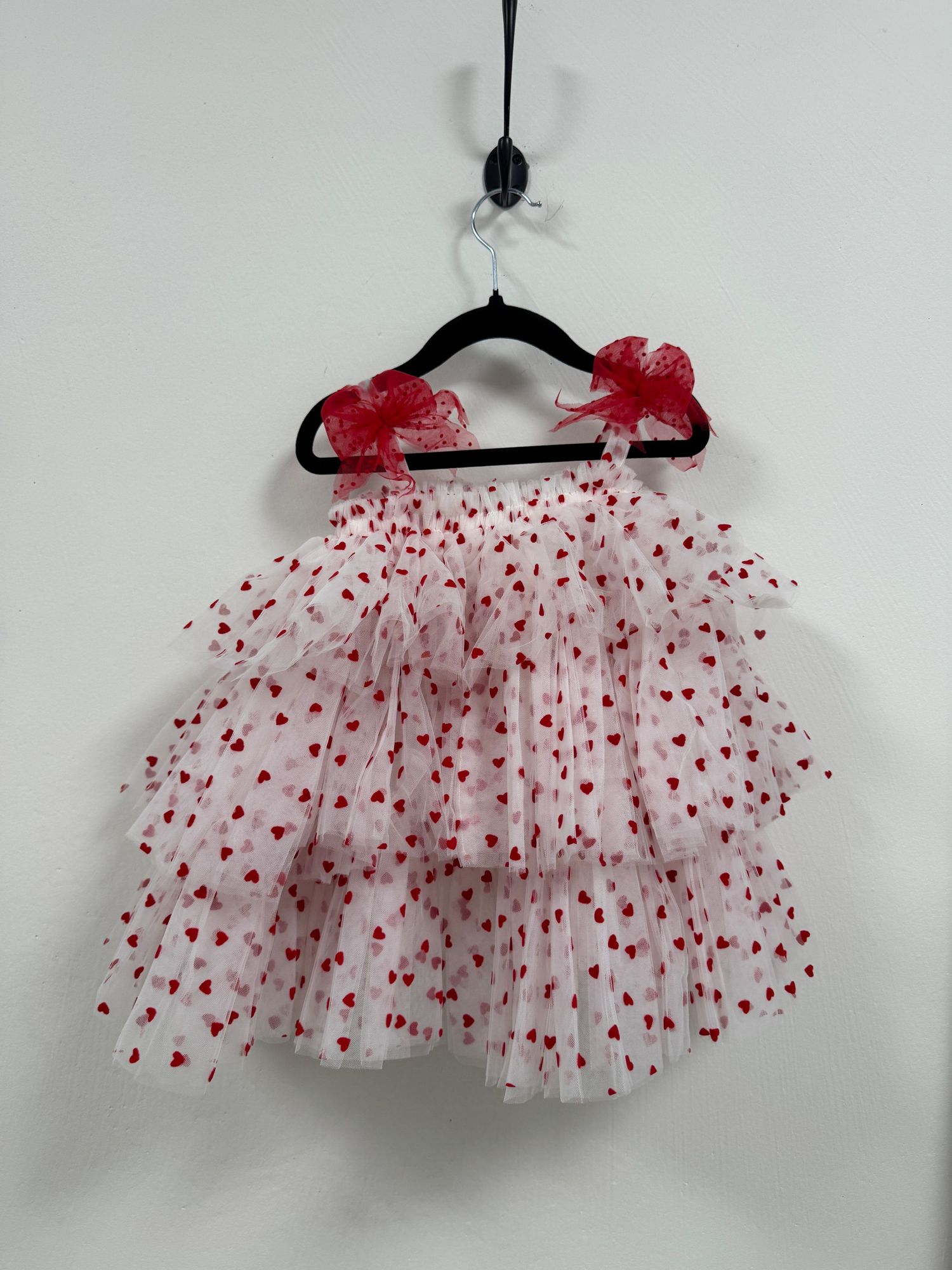 Pretty pink tulle dress with sequined embellishments and ruffled neckline for special occasions, shown in multiple angles.