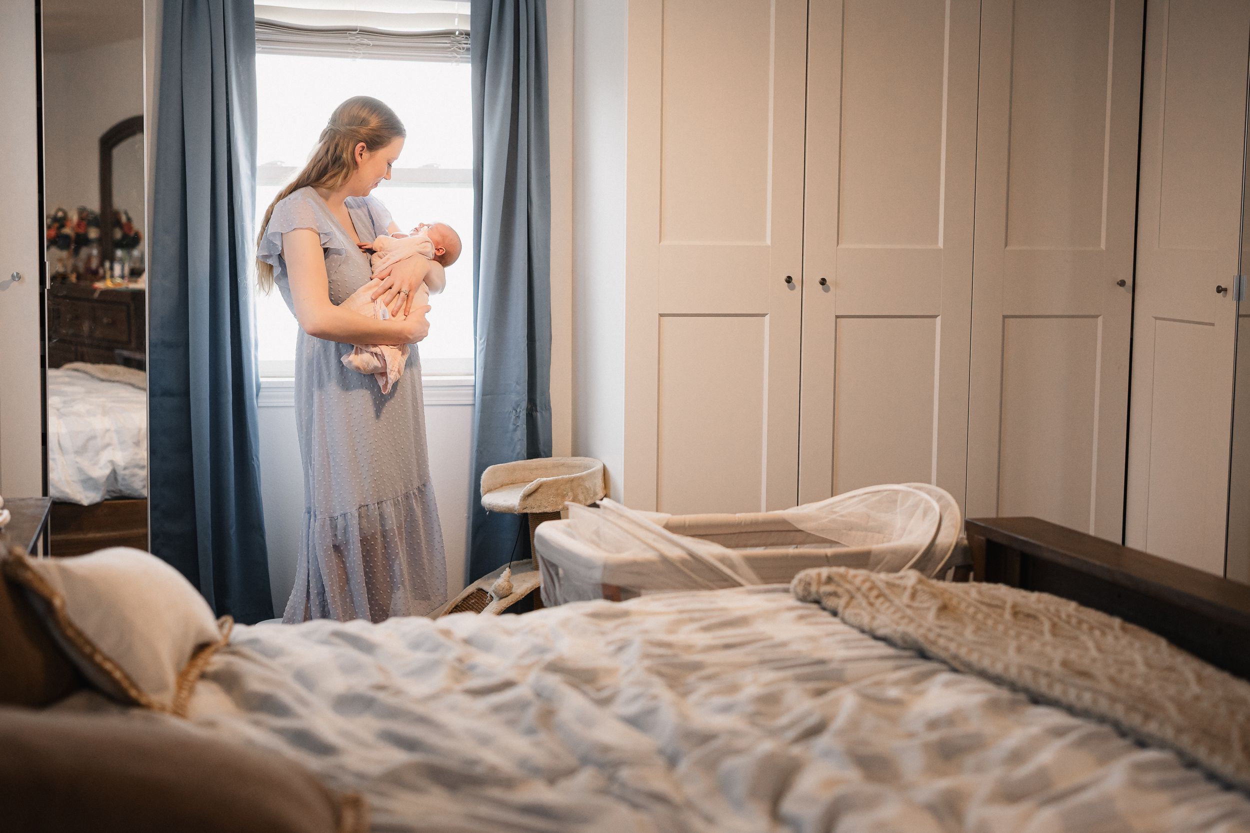 Four connected lifestyle photos show someone in casual clothing looking at their phone while relaxing in a bright bedroom.