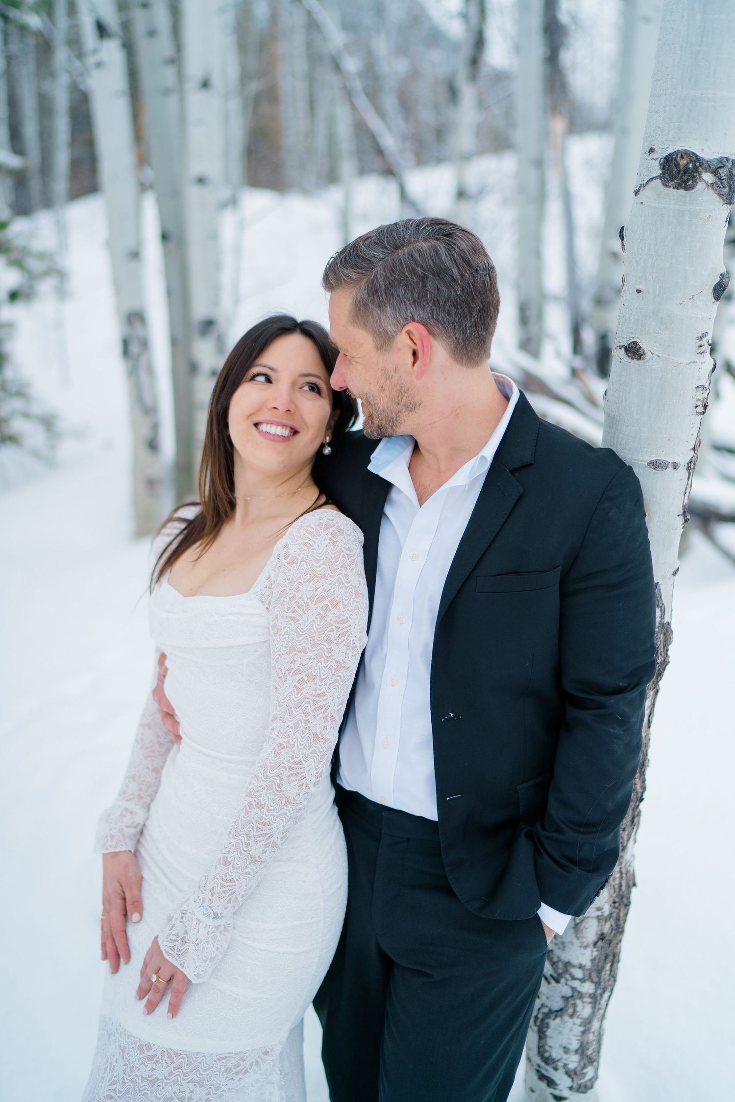 couple standing and smiling