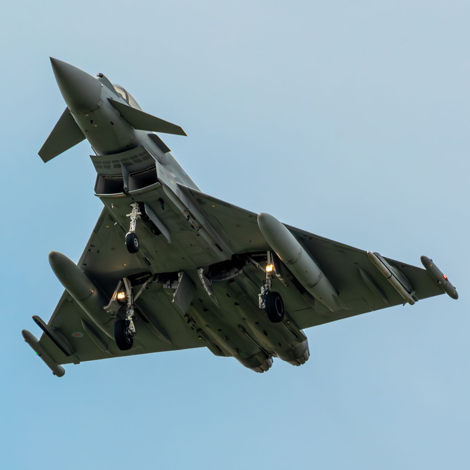 A Eurofighter Typhoon belonging to the Royal Air Force commits to a Low-Approach on Final to RAF Coningsby.