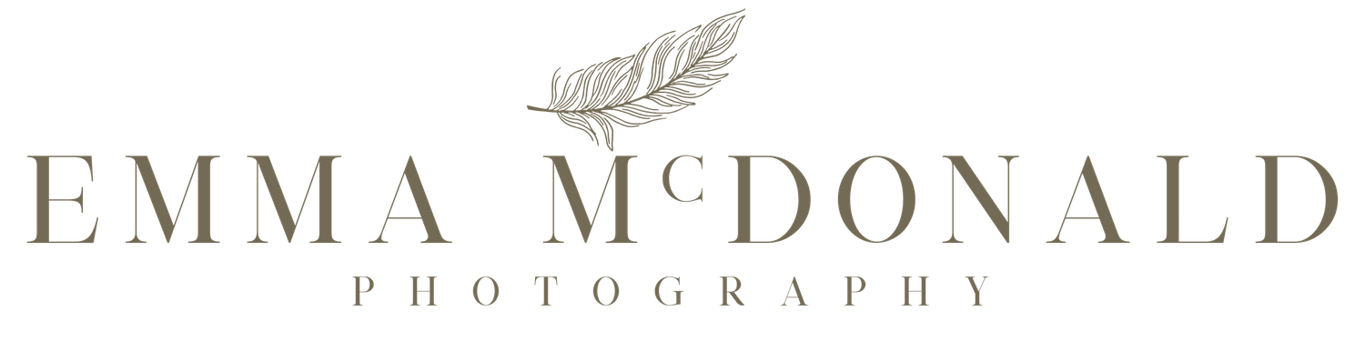 A metallic silver logo design for Emma McDonald Photography appears on a dark background.