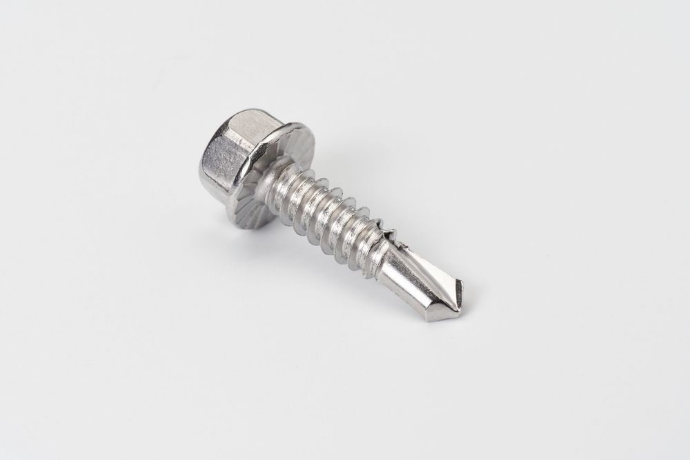 Three stainless steel self-drilling screws with hex heads shown at different angles on a white background.