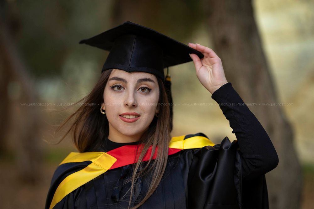 A graduation photo series featuring black cap and gown with yellow accents outdoors.