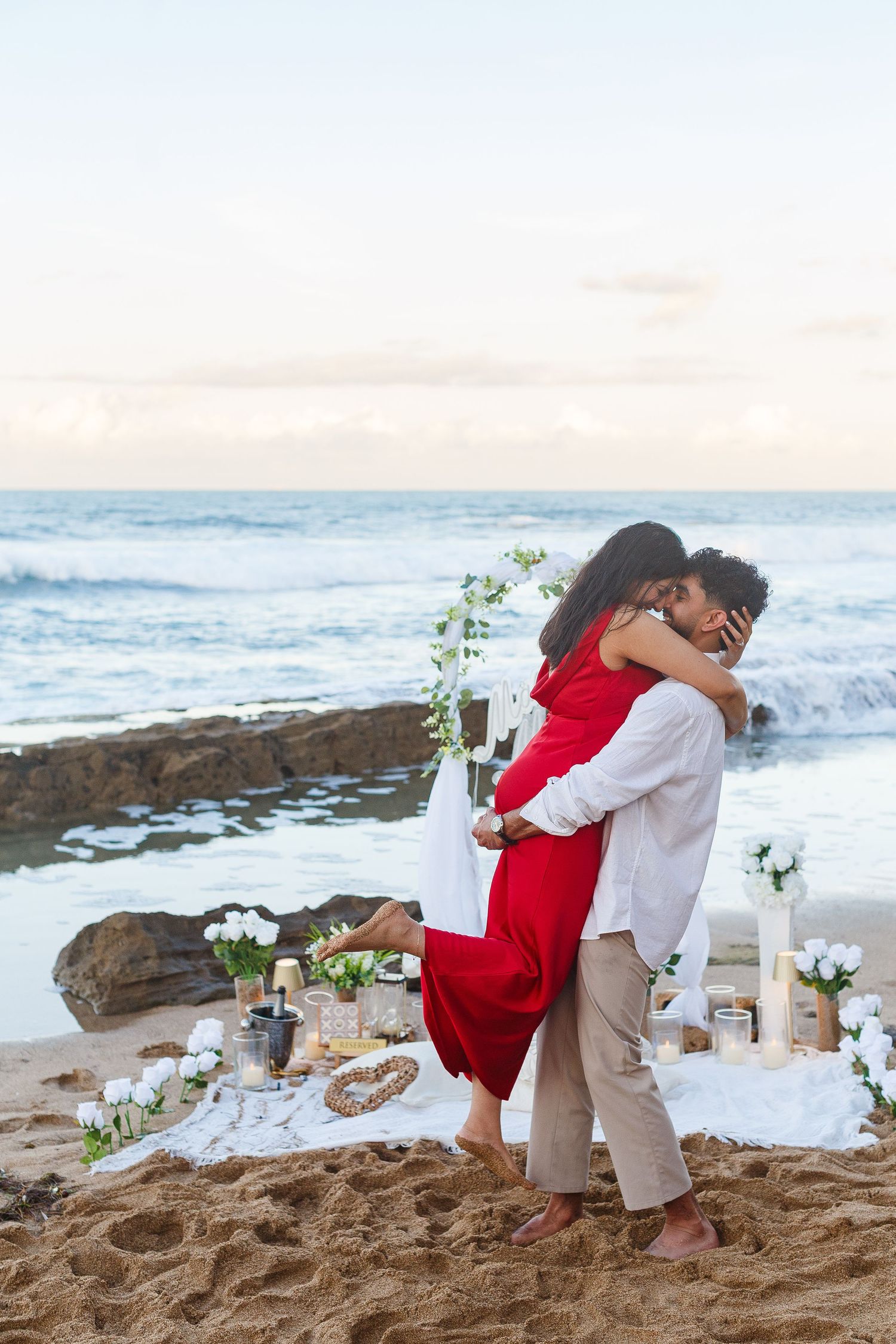 Couples portrait. Proposal and engagement session. Man and woman on the beach. Kikita Surf Beach, Dorado, Puerto Rico.