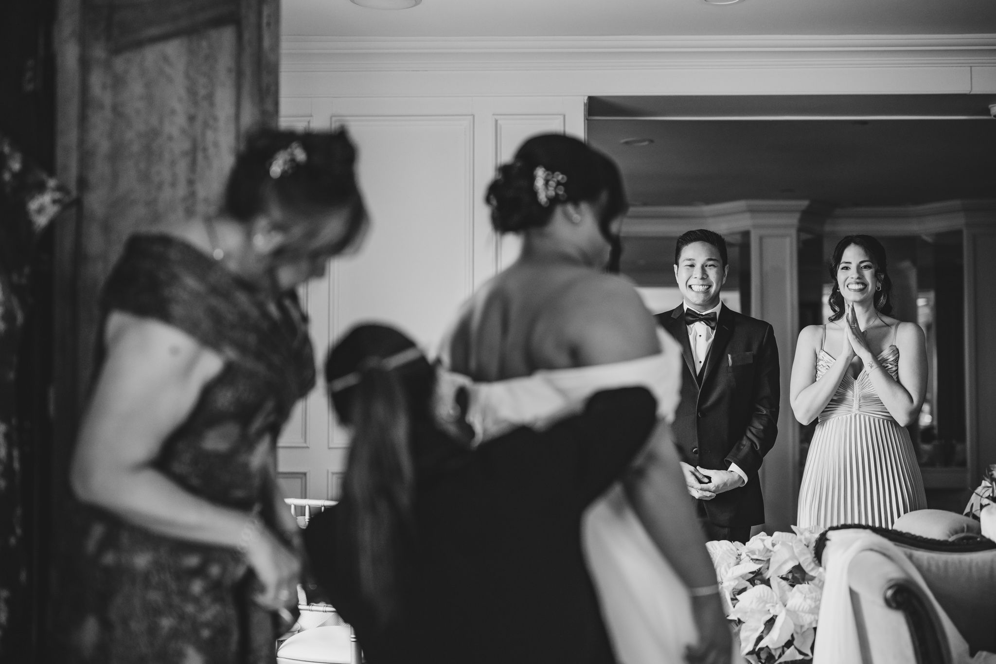 Black and white photo series showing emotional pre-wedding preparation moments.