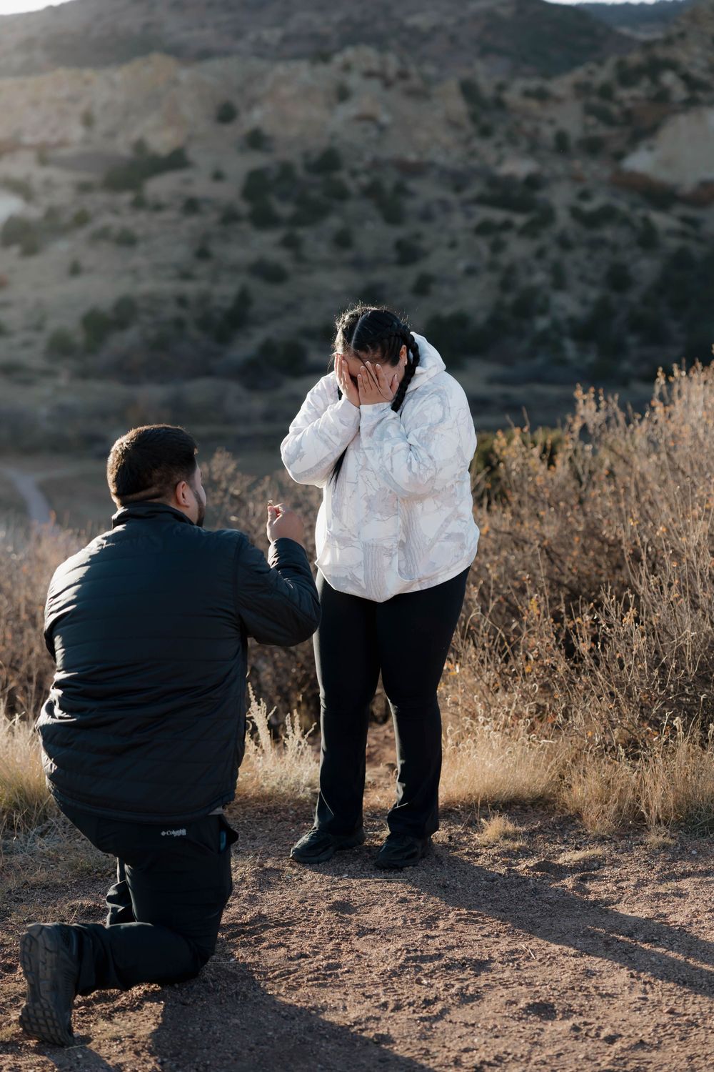 A series of photos showing a photographer taking pictures in a desert landscape during golden hour.