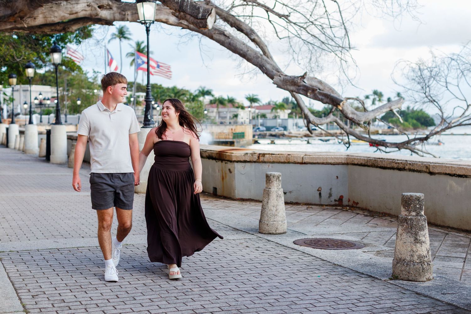 Couples portrait along the Paseo de la Princesa in Old San Juan, Puerto Rico.