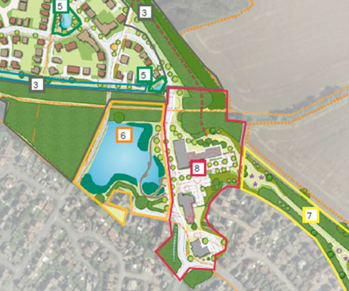 Aerial site plan map showing numbered zones of a mixed-use development with green spaces, a pond, and residential areas.