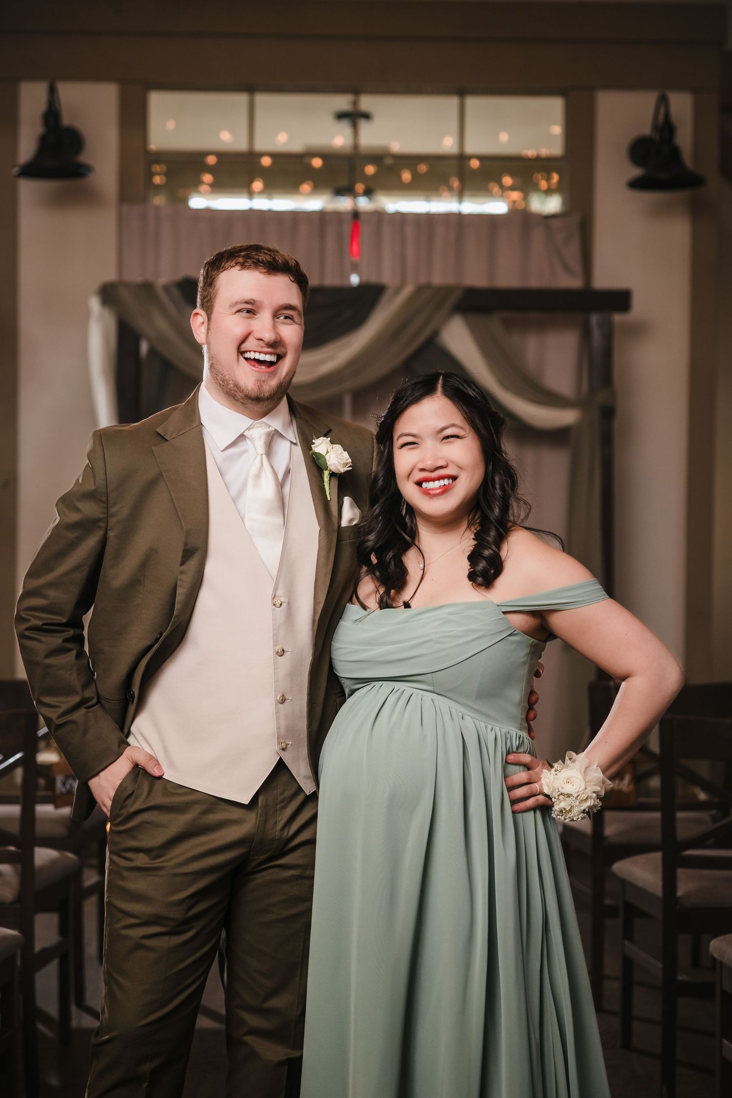 Wedding party portrait inside Briar Barn Inn ceremony space with warm lighting and rustic barn details in Massachusetts