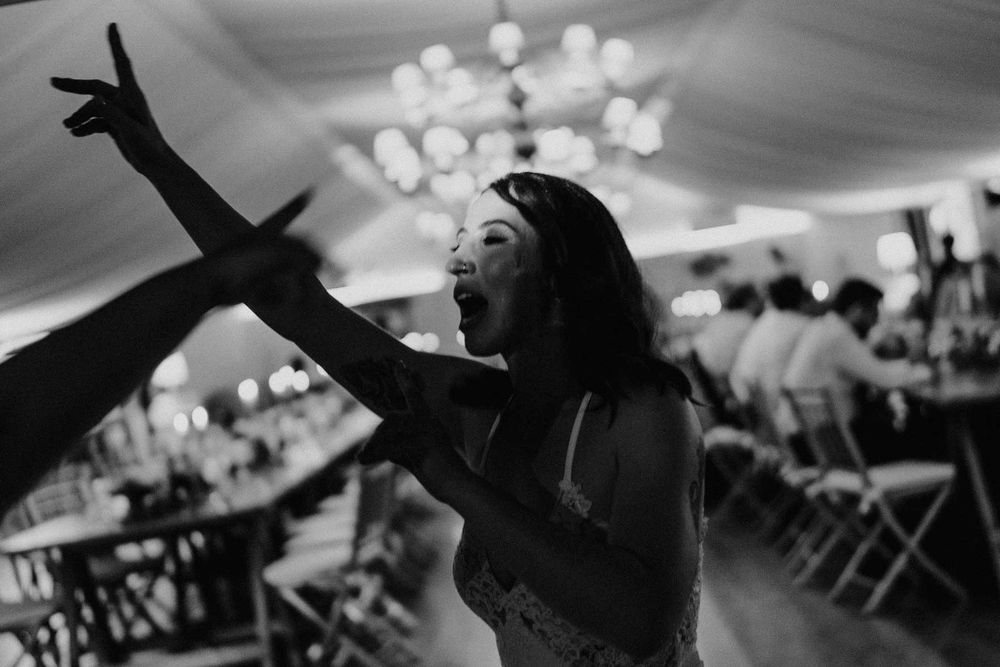 wedding guest holding drink dancing night porto