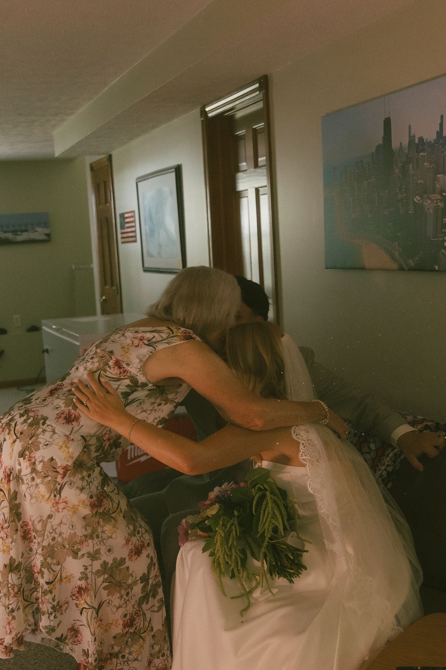 A sequence of photos showing someone in a floral dress helping adjust another person's wedding gown in a hallway.