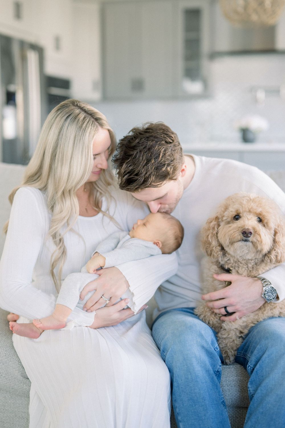 mom, dad holding baby and dog - northern virginia newborn photographer