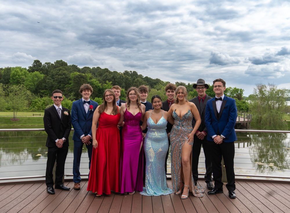 Mooresville High School seniors smiling together for a group prom photo.