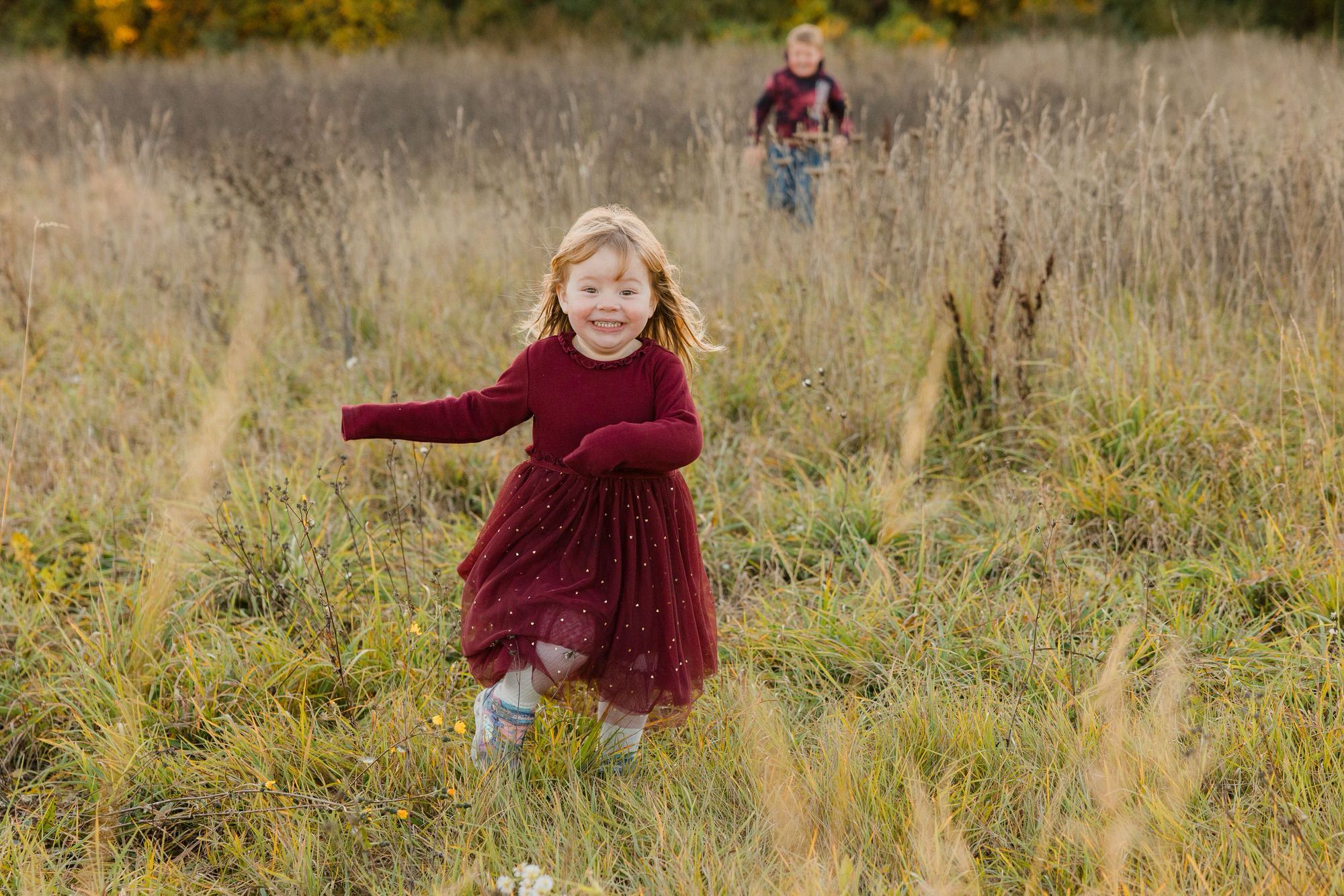 A series of candid outdoor portraits in a golden autumn field with tall grass and natural lighting.