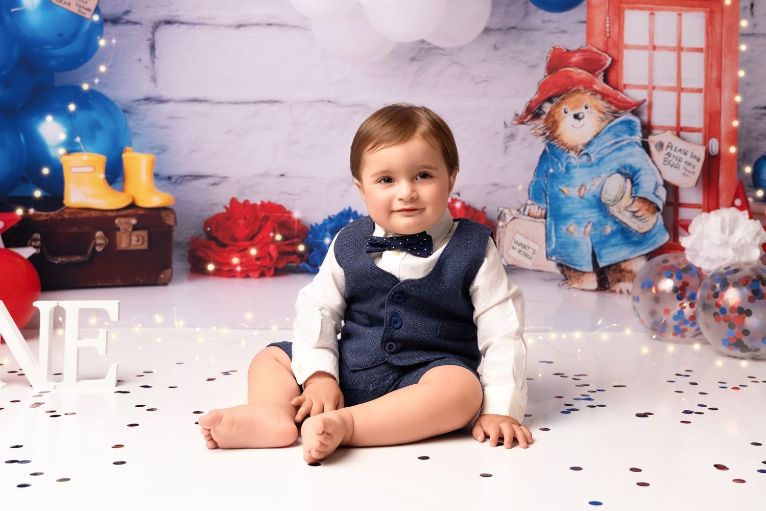 Turning one is a big deal—celebrate with a fun and playful cake smash session, filled with laughter and cake-covered smiles!