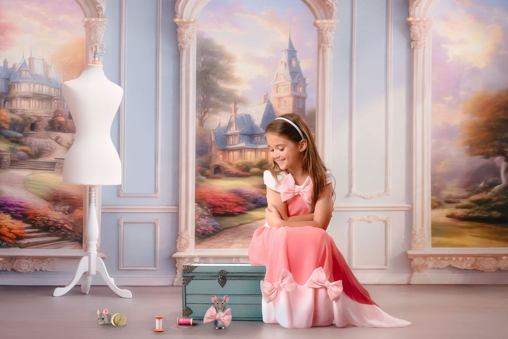 A woman in pink dress sits gracefully by the window in an elegant blue and gold decorated room.