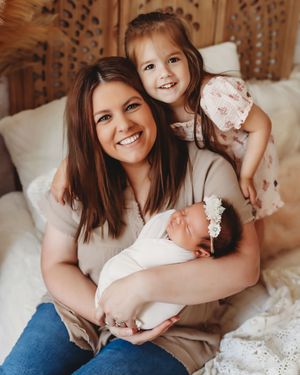 A collection of joyful lifestyle portraits showing tender moments between mother and baby on a bed with soft lighting.