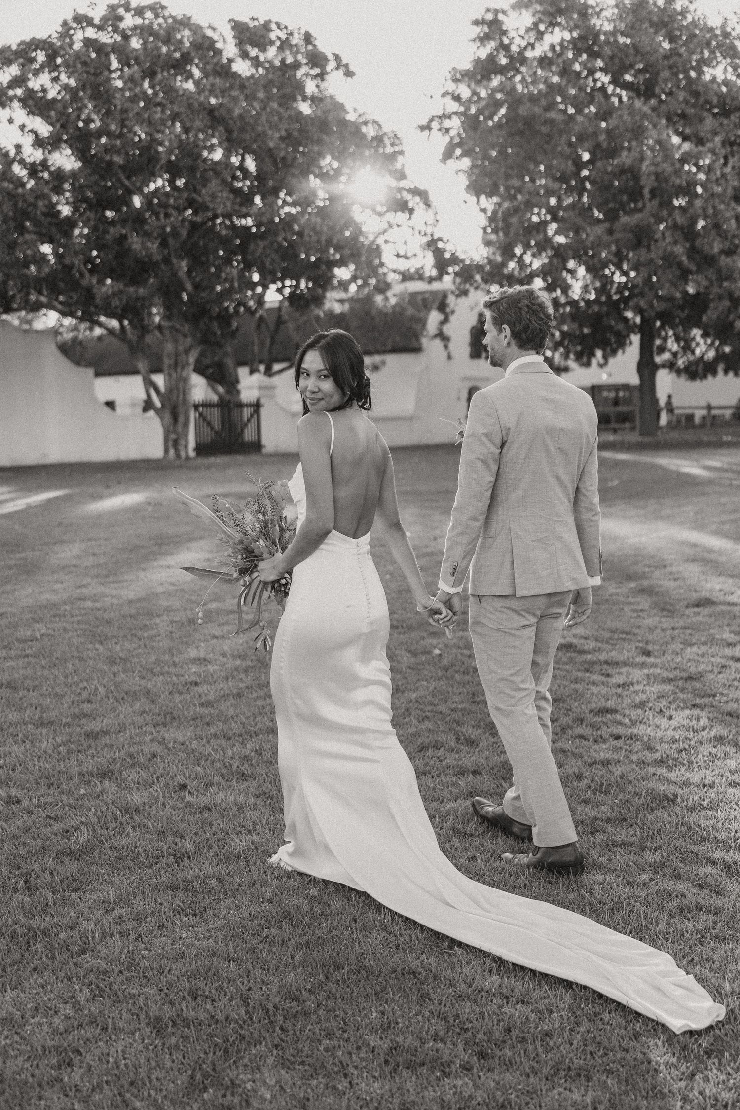 Allert and Lauren at Babylonstoren, documentary wedding photos capturing authentic celebrations.